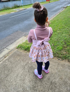 Bow Back Peplum